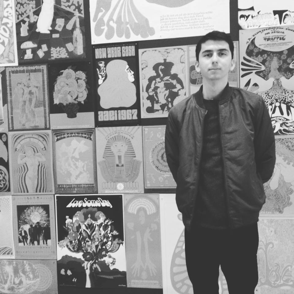 Me standing in front of art